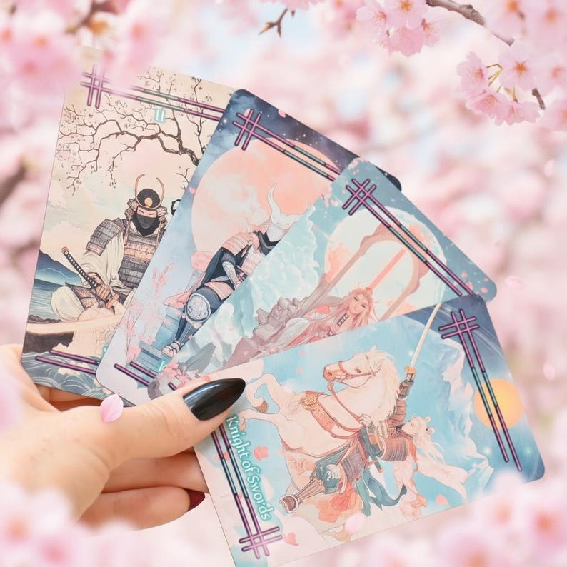 May include: A set of four rectangular tarot cards featuring illustrations of samurai figures in armor. The cards display soft pastel colors, cherry blossom motifs, and the text Knight of Swords. Each card is framed with a double-line border design.