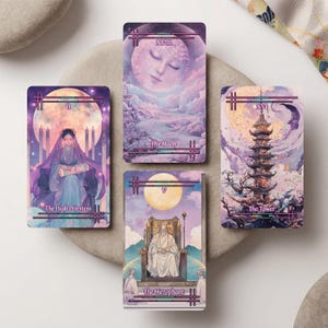 May include: Four rectangular tarot cards featuring purple and pink hues. The cards are labeled The High Priestess, The Moon, The Tower, and The Hierophant. Each card displays intricate illustrations of figures, a pagoda, and a moon, with Roman numerals.