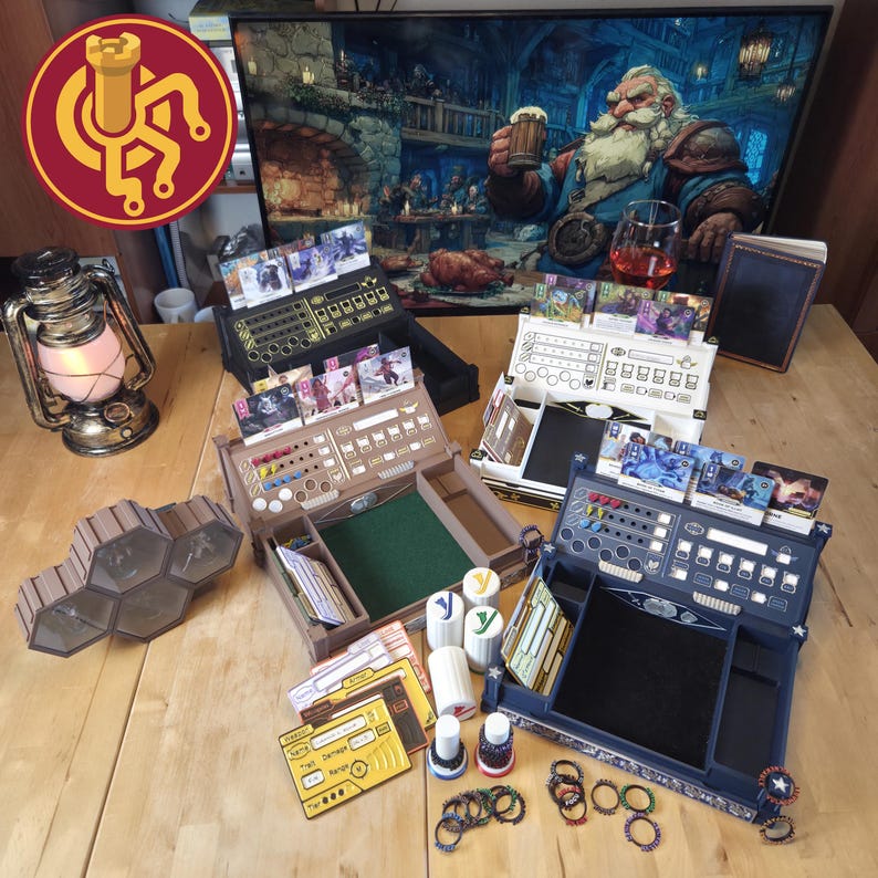 May include: A collection of tabletop gaming accessories, including player boards, card holders, dice, and tokens. The boards are in various colors, with slots for cards and dice. A decorative lantern and a hexagonal tile set are also present. The background features a digital painting.