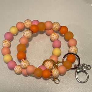 Orange leopard beaded wristlet keychain