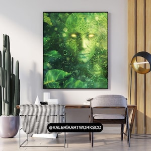 May include: A digital art print featuring a green and yellow face with glowing eyes, surrounded by green leaves and abstract patterns. The print is framed in black and has the text "@VALERIAARTWORKSCO" at the bottom.