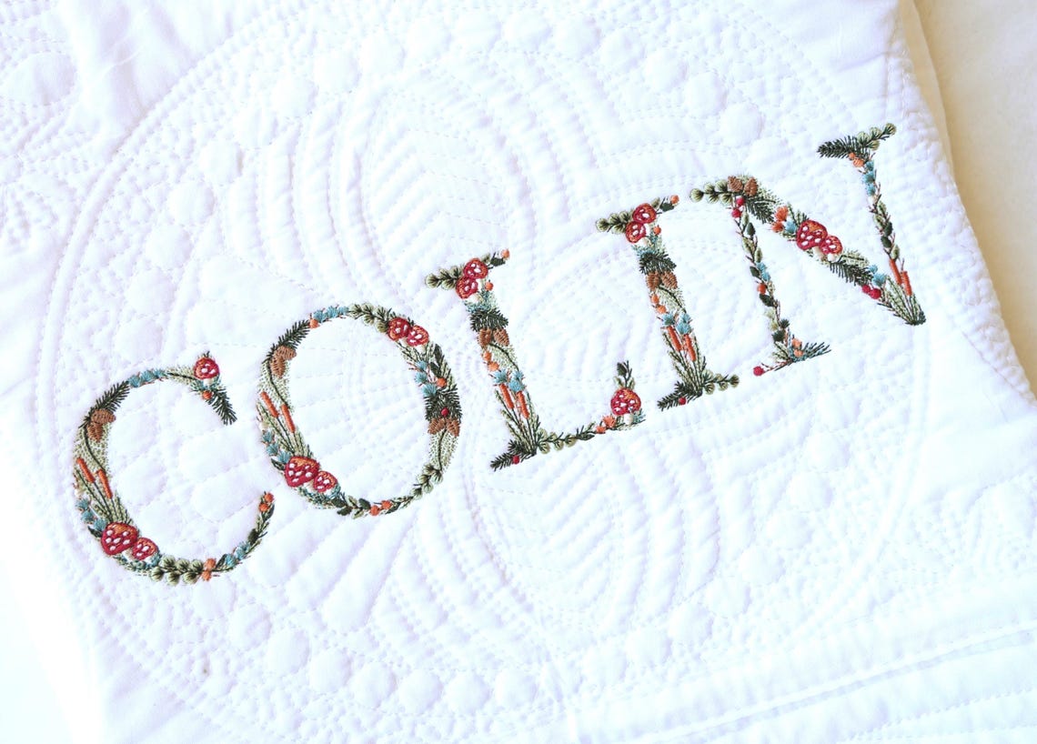 Embroidered Woodland Mushroom Baby Quilt