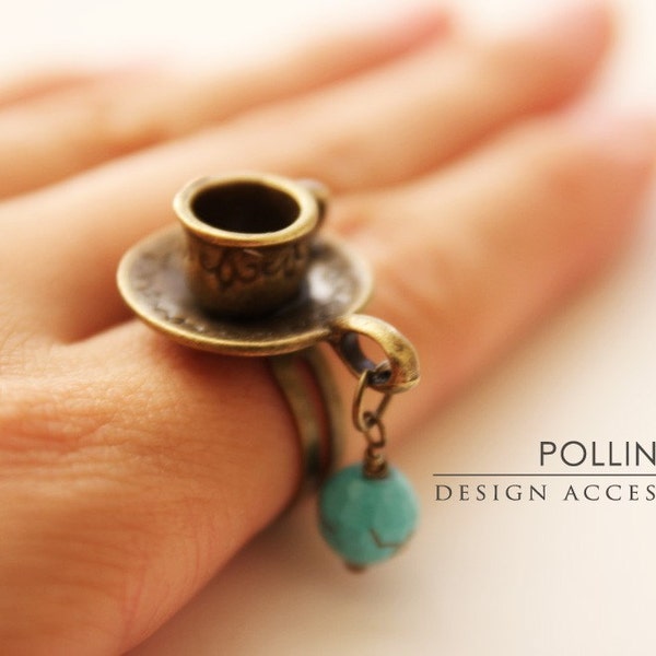 Tienen una taza de té.  Anillos de estilo vintage té y plato. Azul turquesa (RG-05)