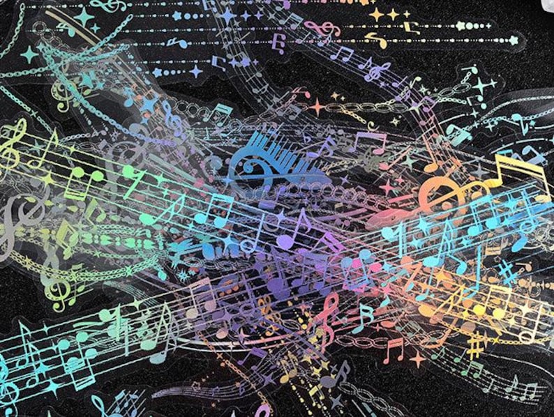 May include: A holographic sheet of music notes and musical symbols in a rainbow of colors on a black background.