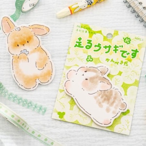 Puede incluir: Un surtido de art&iacute;culos de papeler&iacute;a con tem&aacute;tica de conejos. Incluye pegatinas de conejos, cinta decorativa y crayones. Las pegatinas tienen un estilo acuarela con tonos suaves de naranja y marr&oacute;n. El texto del embalaje est&aacute; en japon&eacute;s.