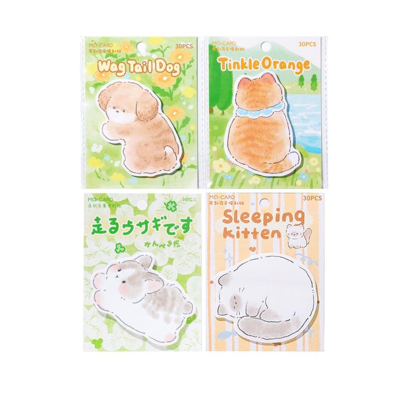 Puede incluir: Cuatro paquetes de pegatinas con ilustraciones de animales adorables. Las pegatinas representan un perro marr&oacute;n, un gato naranja, un conejo gris y blanco y un gato blanco durmiendo. Cada paquete tiene el texto "MO-CARD" y "30PCS".