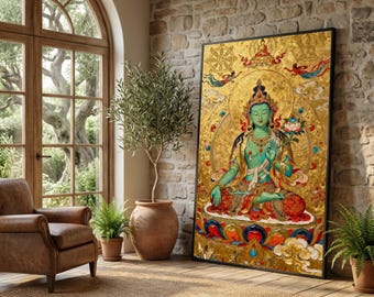 May include: A large framed artwork depicting a seated Buddha figure with a teal complexion, adorned in gold and red robes. The background is a radiant gold with intricate details. The artwork is displayed in a room with a leather armchair, a potted olive tree, and a jute rug.