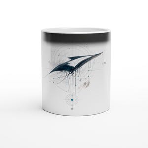 May include: White ceramic mug featuring a stylized, abstract design in shades of blue and black. The artwork includes geometric shapes and lines, creating a modern, artistic aesthetic. The mug has a glossy finish and a cylindrical shape.