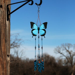 Blue butterfly wind chimes for your home and garden. Beautiful gift for memorial, sympathy, butterfly lover, mothers day, or housewarming