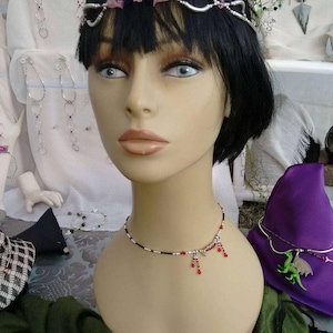 Vampire fangs w "blood" drops made of Swarovksi crystal brockus creations