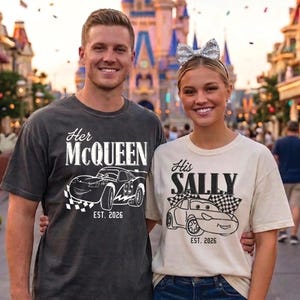 May include: Two people wearing matching t-shirts with Cars movie graphics. One shirt says "Her McQueen" with a race car design, the other says "His Sally" with a similar car graphic. Both shirts have "EST. 2026" below the design.