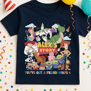 May include: Navy blue t-shirt featuring a colorful graphic of characters from a popular animated movie. The text "ALEX'S STORY" and "YOU'VE GOT A FRIEND WHO'S 4" are also displayed. Party decorations, including balloons and confetti, are in the background.