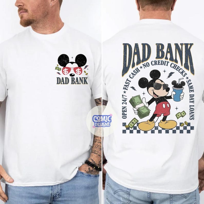 May include: White t-shirt with a Mickey Mouse-inspired graphic. The front features the text "DAD BANK" with a Mickey Mouse head wearing sunglasses. The back displays Mickey with money and a coffee cup, with text "DAD BANK" and "OPEN 24/7 FAST CASH NO CREDIT CHECKS SAME DAY LOANS."