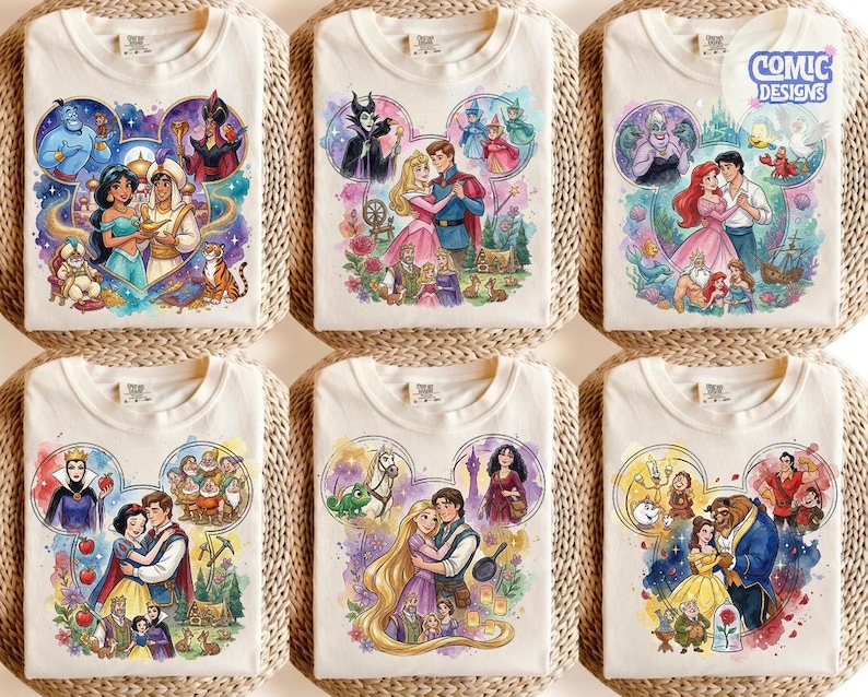 May include: Six off-white t-shirts featuring watercolour-style illustrations of Disney couples arranged in Mickey Mouse head silhouettes. Each shirt displays characters from Aladdin, Sleeping Beauty, The Little Mermaid, Snow White, Tangled, and Beauty and the Beast.