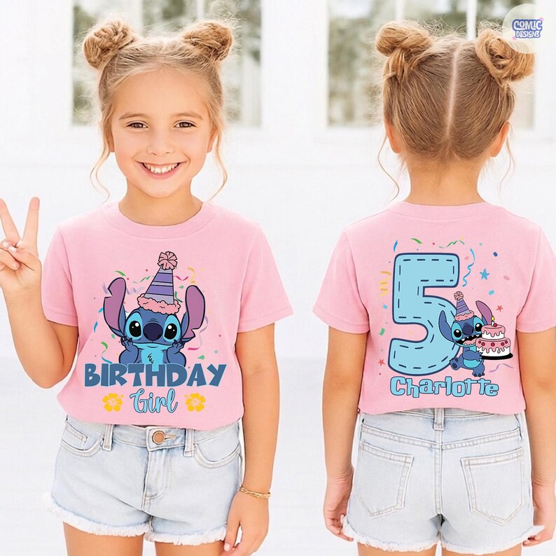 May include: Pink short-sleeved t-shirt featuring a cartoon character with a party hat and the text "BIRTHDAY Girl". The back of the shirt has a large number 5 and the name "Charlotte".