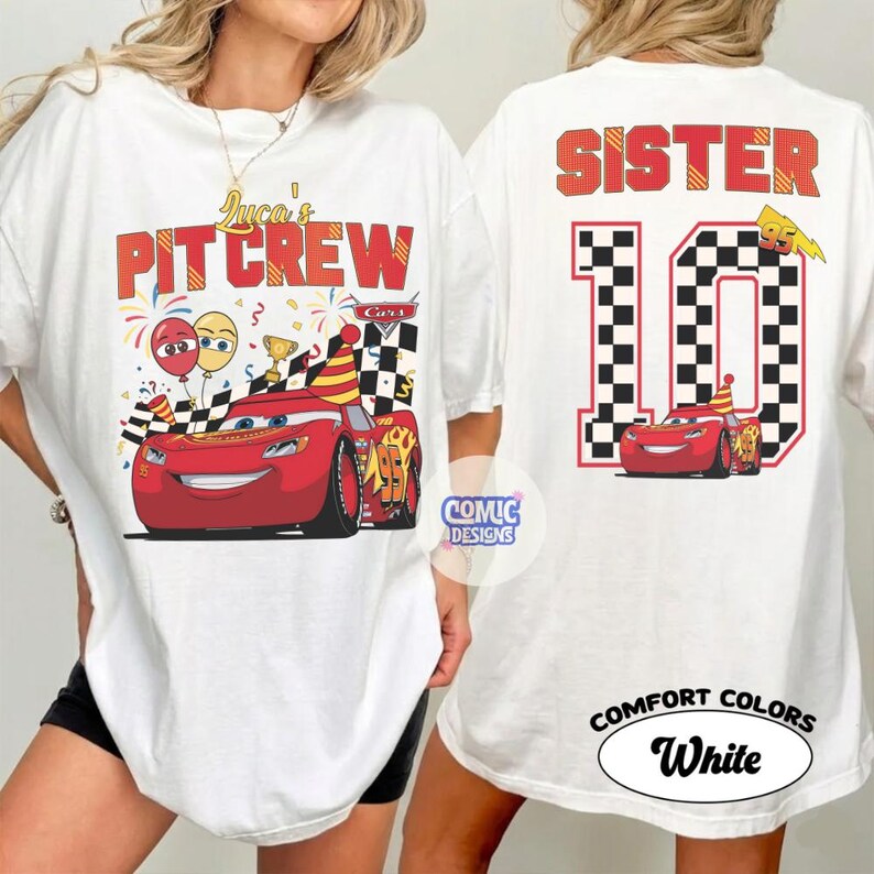 May include: White t-shirt featuring a red race car graphic with the text "Luca's PIT CREW" on the front. The back of the shirt displays the word "SISTER" above a checkered number 10 and a matching race car.