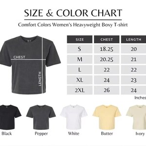 May include: A size and color chart for a Comfort Colors heavyweight boxy t-shirt. The chart displays chest and length measurements in inches for sizes S through 2XL. Five t-shirt color options are shown: black, pepper, white, butter, and ivory.