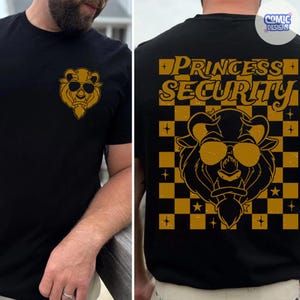 May include: Black t-shirt featuring a gold illustration of a bear wearing sunglasses. The front of the shirt has a small bear graphic. The back of the shirt has the words "PRINCESS SECURITY" above a bear graphic on a gold and black checkered background.