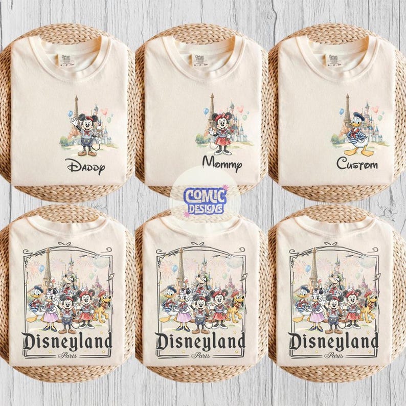 May include: Six off-white t-shirts featuring Disney character graphics. The top row shows individual characters with text reading Daddy, Mommy, and Custom. The bottom row displays a group of characters with the text Disneyland Paris.