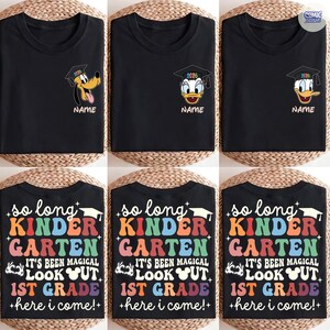 May include: Black t-shirts featuring cartoon characters Pluto and Donald Duck wearing graduation caps with the year 2026. The shirts also display the text "NAME". Additional shirts have the text "so long KINDER GARTEN... 1st GRADE +here i come!+"