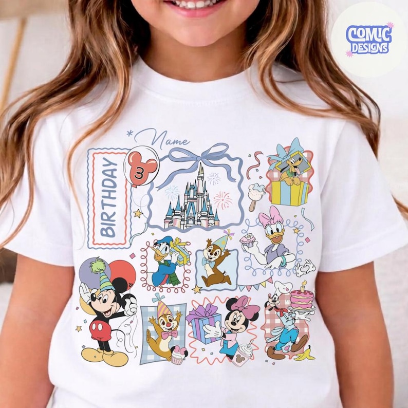 May include: White t-shirt featuring a colorful birthday design with Disney characters like Mickey Mouse, Donald Duck, and Minnie Mouse. The design includes a castle, balloons, and the word "Birthday". The shirt is for a child's third birthday.