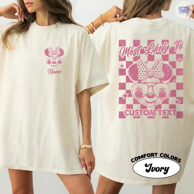 May include: Ivory-colored t-shirt featuring a pink Minnie Mouse graphic with glasses and a bow. The front has a name field, while the back displays "Most Likely To" and "Custom Text" within a pink checkered design. The shirt is labeled "Comfort Colors" and "Ivory".