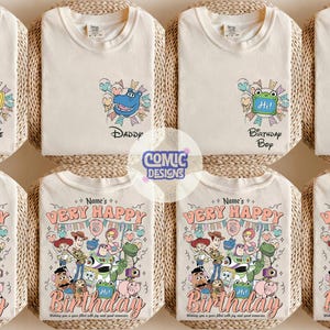 May include: Off-white t-shirts with colorful cartoon character designs. Some shirts have text like "Auntie", "Daddy", "Birthday Boy", and "Birthday Girl". Other shirts feature a graphic with the text "Very Happy Birthday".