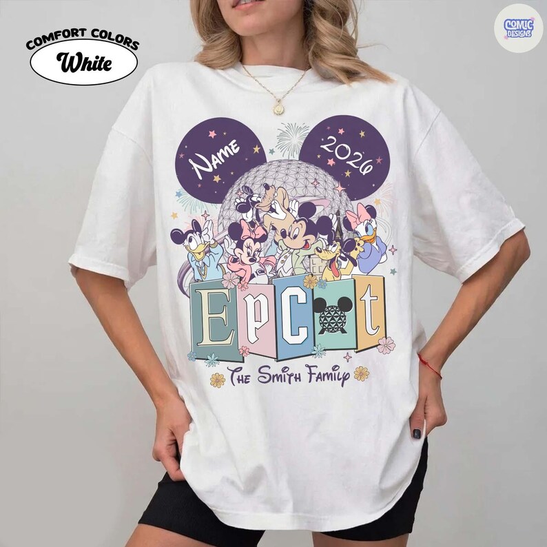May include: White Comfort Colors t-shirt featuring a colorful graphic of Disney characters, including Mickey and Minnie Mouse, Donald Duck, and Goofy. The design includes the text "EPCOT" and "The Smith Family". The shirt also has the text "Name" and "2020".