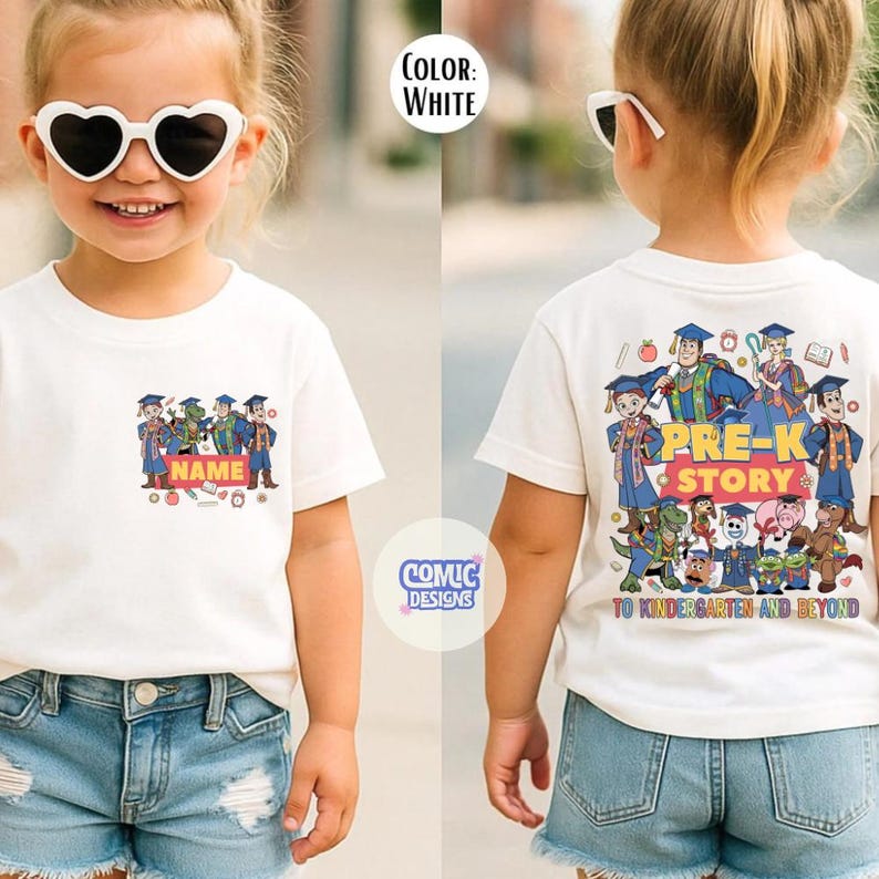 May include: White t-shirt with a colorful graphic featuring cartoon characters and the text "NAME" on the front. The back of the shirt displays "PRE-K STORY" and "TO KINDERGARTEN AND BEYOND".