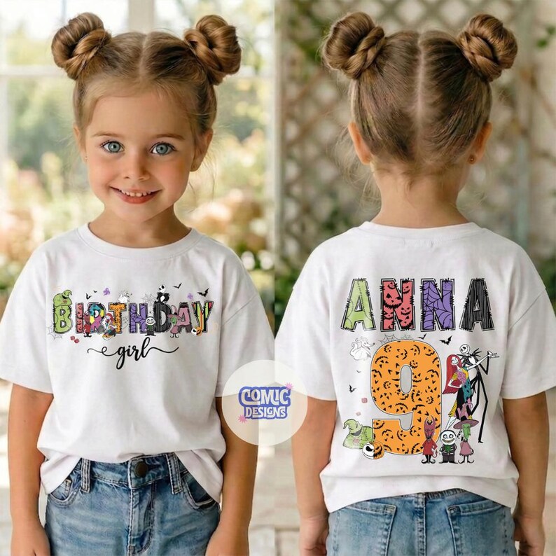 May include: A white short-sleeve t-shirt featuring a graphic print. The front displays the text Birthday girl in a stylized font. The back shows the name Anna above the number 9, decorated with various cartoon characters and pumpkin patterns.