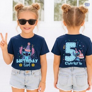 May include: Navy blue t-shirt with a Stitch graphic wearing a party hat and the text "BIRTHDAY Girl". The back of the shirt features a large number 5, Stitch, and the name "Charlotte".