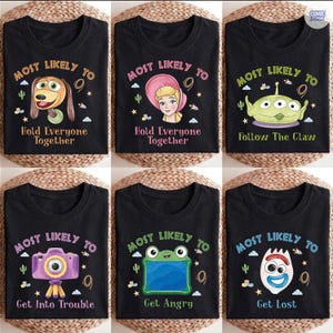 May include: Six black t-shirts featuring cartoon character graphics and text. Designs include Slinky Dog with 'Most Likely To Hold Everyone Together', Cinderella, an alien with 'Follow The Claw', a camera, a frog, and Forky with 'Get Lost'.