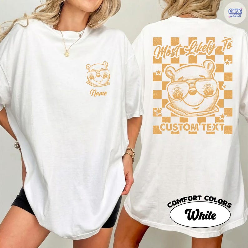 May include: White t-shirt with a cartoon bear wearing sunglasses. The front of the shirt has the bear graphic and the word "Name". The back features the text "Most Likely To" above the bear graphic and "Custom Text" below it, set against a gold checkered background.