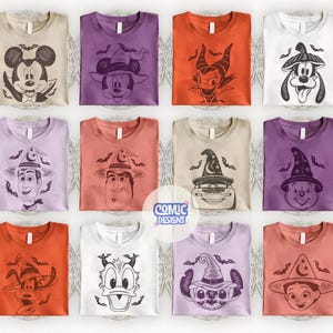 May include: Collection of Halloween-themed t-shirts featuring cartoon characters in witch hats. Designs include Mickey Mouse, Minnie Mouse, Donald Duck, and others. Shirts are in various colors, including orange, purple, and beige.