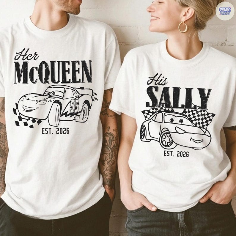 May include: White t-shirts with black graphic designs. One shirt says "Her McQueen" with a drawing of a race car and "EST. 2026". The other says "His Sally" with a car and "EST. 2026".