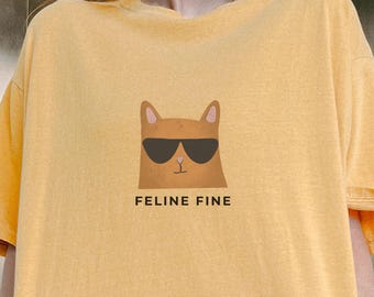 サングラスをかけたネコ科の美しい猫：コンフォートカラーのグラフィックTシャツ