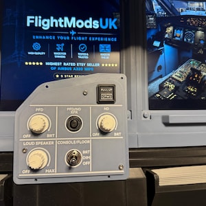 May include: A light gray flight simulator control panel featuring three white rotary knobs, one black push-button labeled PULL UP GPWS, and a metal toggle switch. The panel includes labels for PFD, ND, LOUD SPEAKER, and CONSOLE/FLOOR with brightness settings.