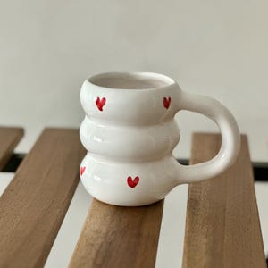Handmade ceramic mug with red hearts – Original handcrafted cup – Lovers gift idea