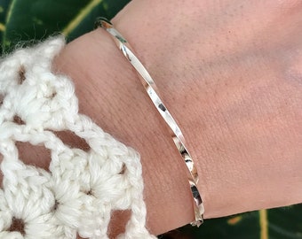 Thick twisted bangle bracelet in sterling silver. Stacking bracelets for women.