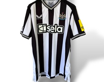 Kit local del Newcastle United 2023/24 - Isak #14 con parche de la Premier League - Usado