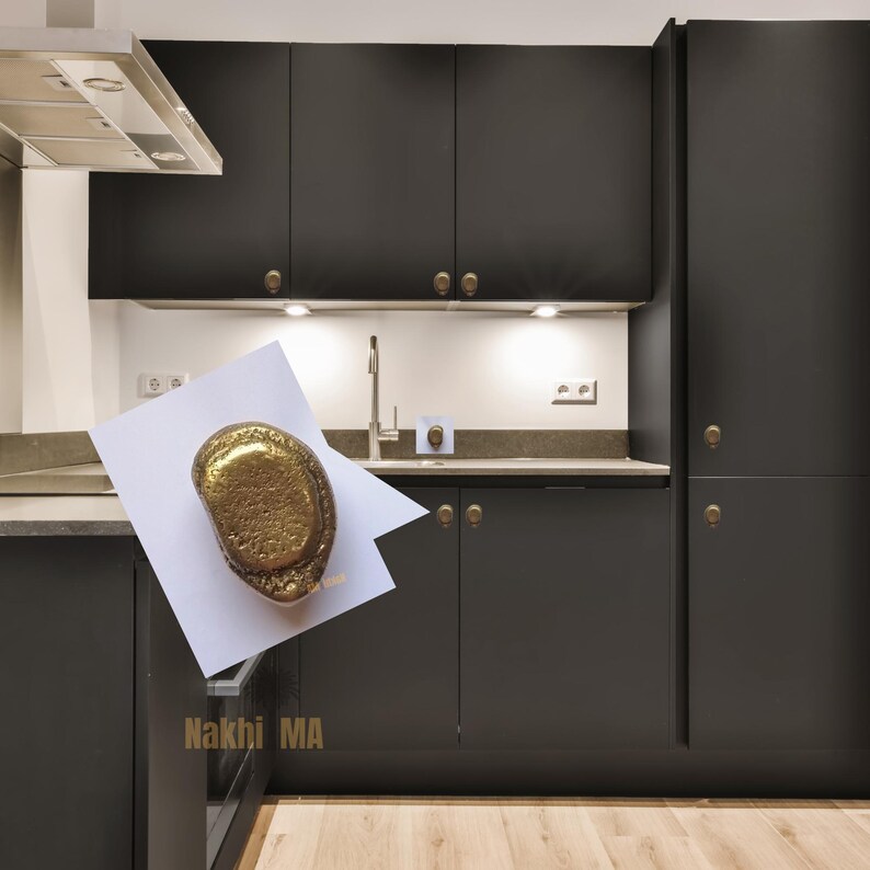 solid brass cabinet knobs, whose earthy, tactile look pays homage to nature's beauty of imperfection. Hand-cast and hand-finished , every piece emerges as a one-of-a-kind sculptural object that is rich with character and antique brass glow.

Brass Handle,
Textured Handle,
Brass Hardware,
Modern Cabinet,
Handmade Handle,
Antique Brass,
Furniture Hardware,
Natural Handle,
Artisan Brass Handle,
Solid Brass Handle,
Kitchen Handle,
Wardrobe Pull Handle,
Brass Knob,