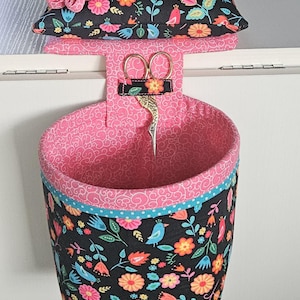 Cotton Fabric Thread Catcher with detachable pin cushion and detachable bin with a tab to hold thread snips.