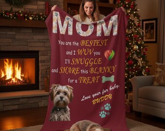 May include: A burgundy blanket with the word "MOM" in large letters. The blanket has text that reads "You are the BESTEST and I WUV you I'll SNUGGLE and SHARE this BLANKY for a TREAT." A dog is pictured on the blanket.