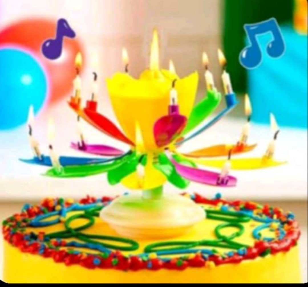 Musical Rotating Flower Birthday Candle: Plays Happy Birthday 14 ...