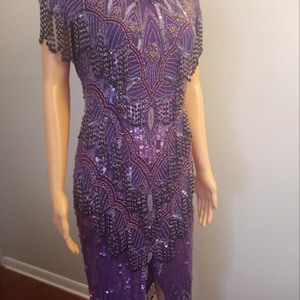 PURPLE Vintage SEQUIN DRESS Pre Owned. Size Medium,this dress was warn to an Exclusive Event as is See all pics to view missing beads & wear