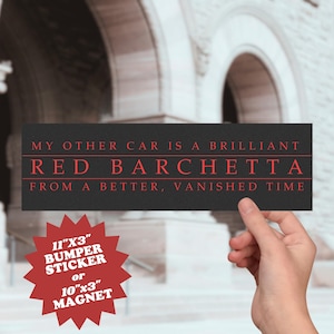 May include: Black bumper sticker with red text: "MY OTHER CAR IS A BRILLIANT RED BARCHETTA FROM A BETTER, VANISHED TIME." The sticker is 28cm x 8cm and also available as a 25cm x 8cm magnet.