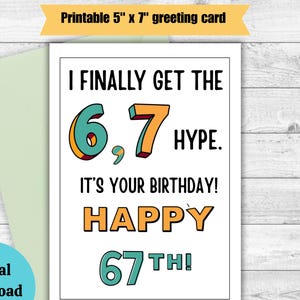 May include: A white greeting card with the text "I FINALLY GET THE 6,7 HYPE. IT'S YOUR BIRTHDAY! HAPPY 67TH!" in various colors. The card is 5" x 7" and is a digital download. An envelope is behind the card.