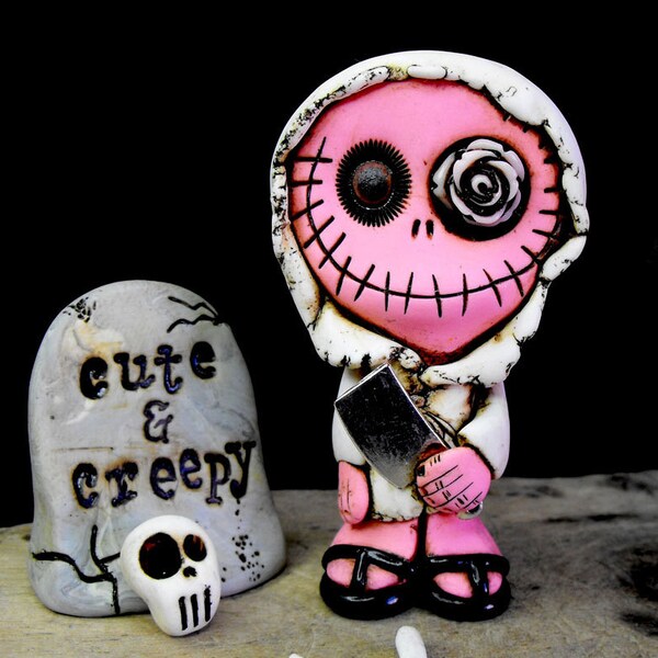 Lady Rosita. Skeleton girl in gum pink dressed in white. A rose in her eye and a knife in her hand