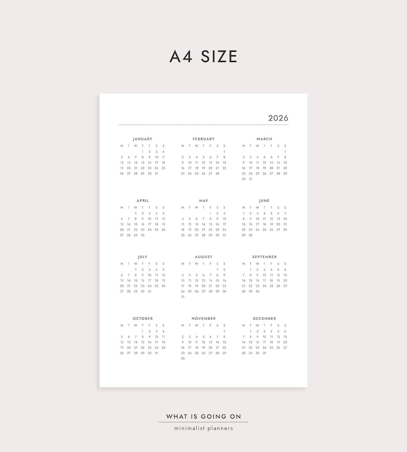 May include: A4 size minimalist planner for the year 2026. The white paper features a yearly calendar layout with each month displayed. The text "WHAT IS GOING ON" and "minimalist planners" are at the bottom.