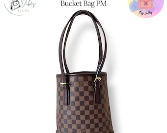 本物のルイ・ヴィトン ダミエ エベヌ バケットバッグ PM：修復済みレザー